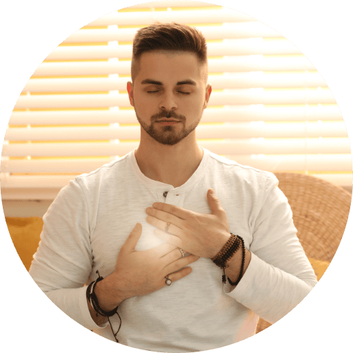 man touching his chest