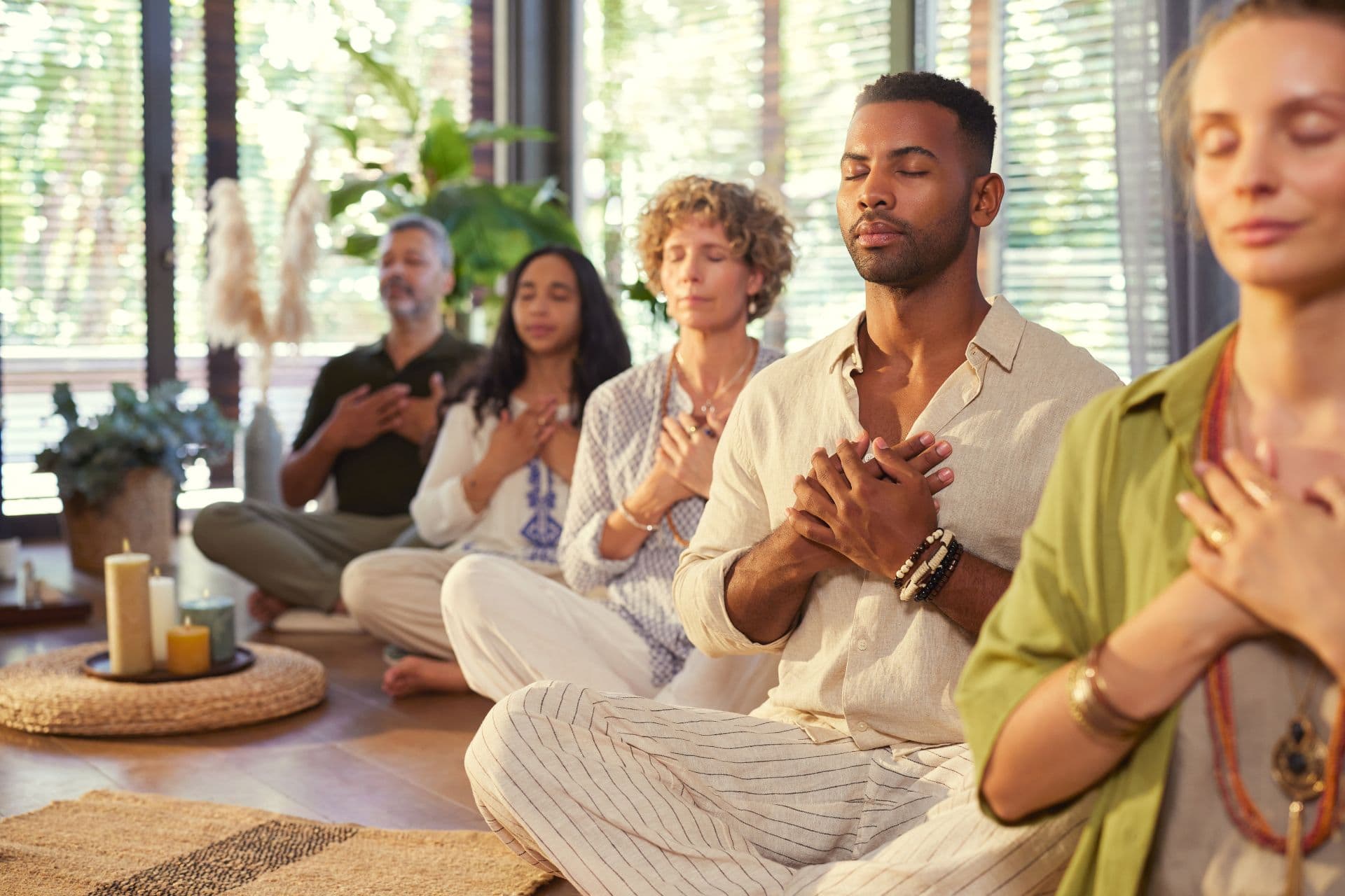 spiritual practice with hands over heart